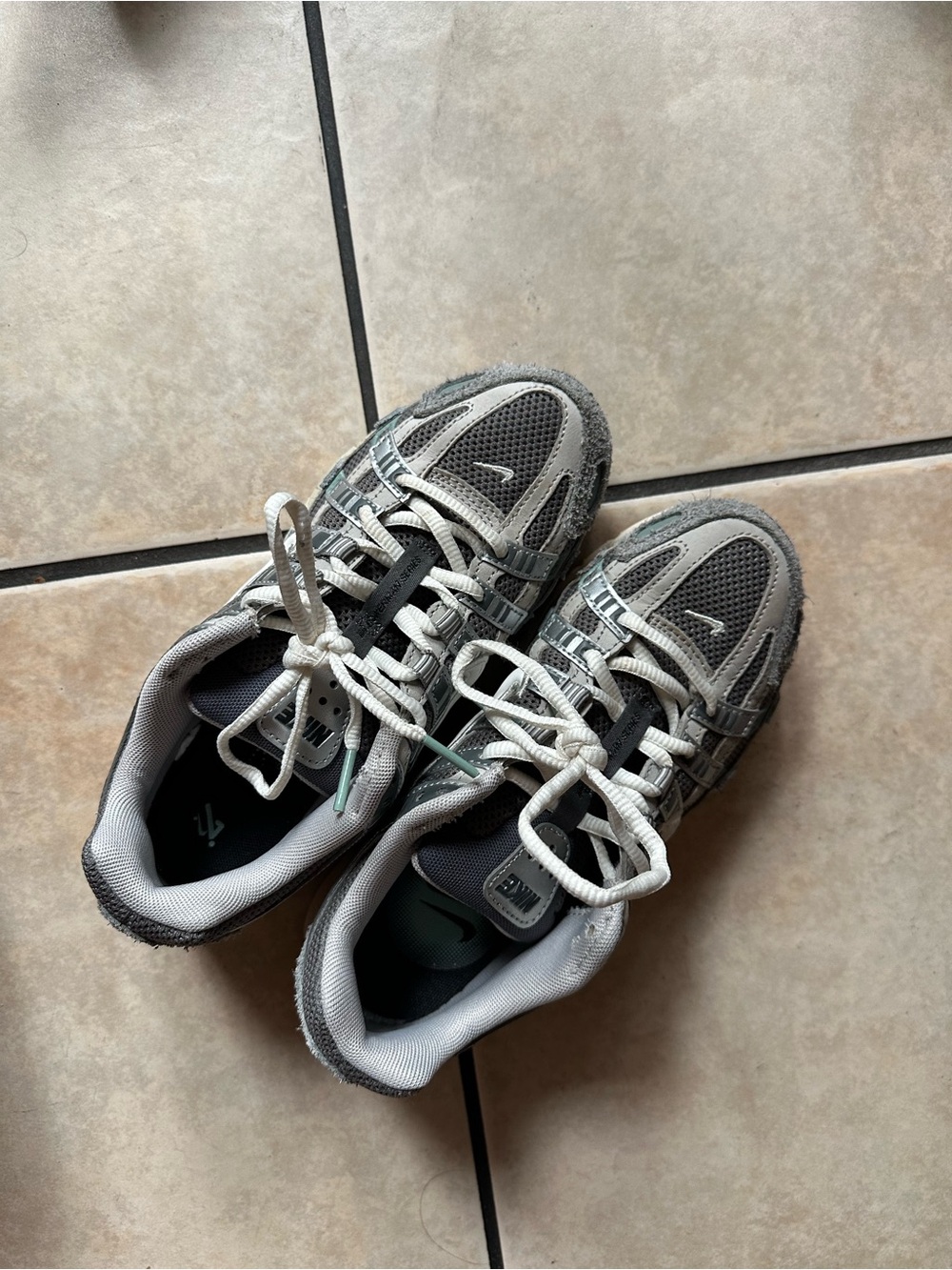 Nike Women's Gray and White Mesh Sneakers